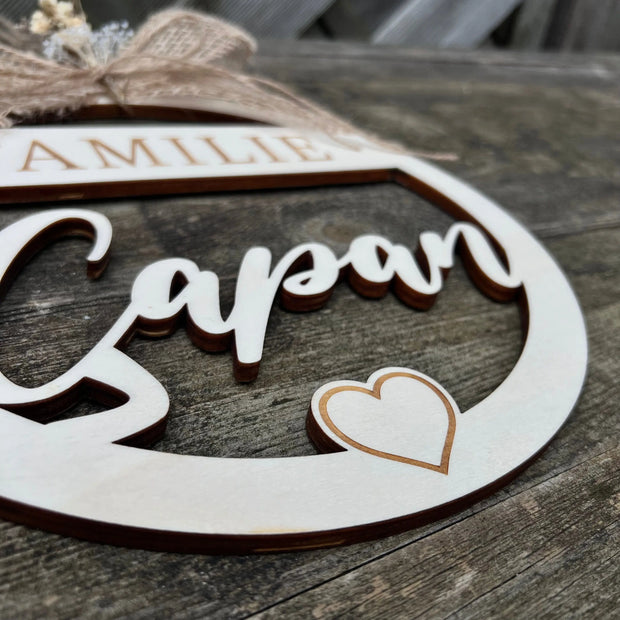 Türschild "Familie" mit Herzchen – personalisiert (Ø 25 cm) Kreativio